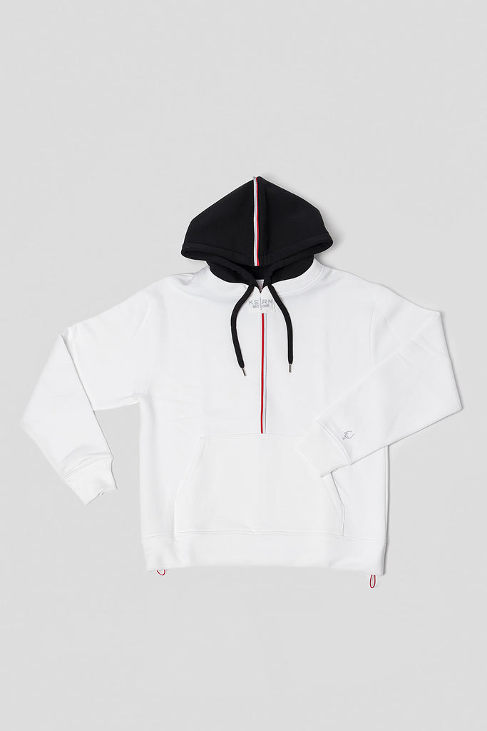 Designer hoodie and sweatshirt in white with black hood. Made of recycled PET bottles from the ocean and organic cotton. This hoodie has an exchangeable hood, adjustable length, reflective tape and embroidery. 