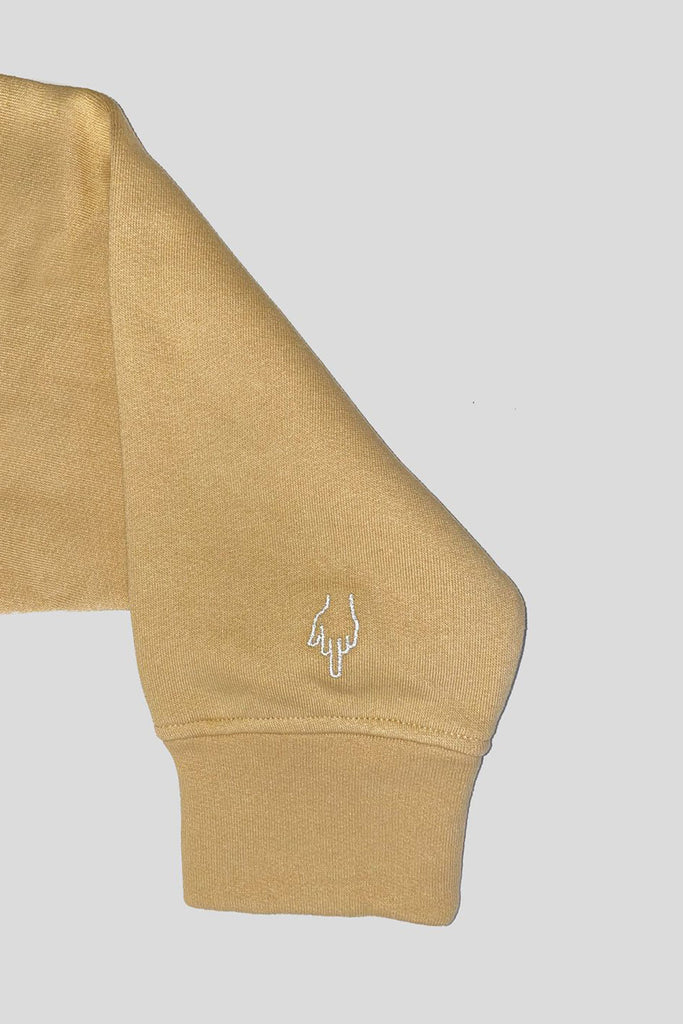 Beige cotton hoodie with reflective embroidery. 
